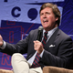 Illustration for article titled Tucker Carlsons Top Writer Resigns After Being Revealed as a Racist (On the Internet)